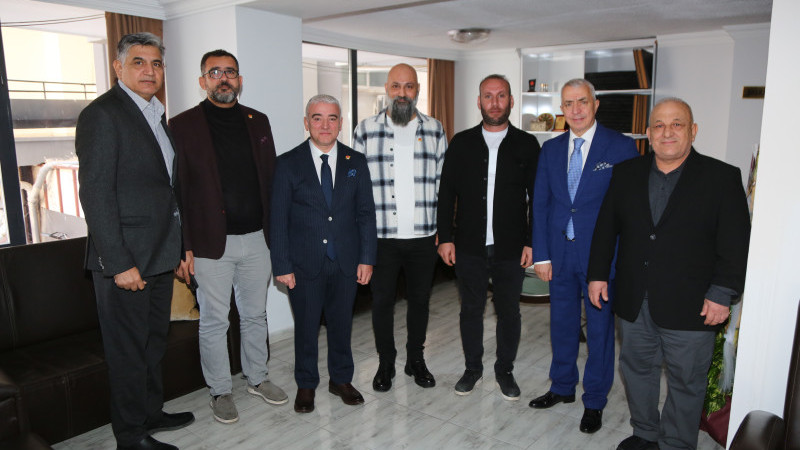 SONER KAN’A ÜYELİK ROZETİ